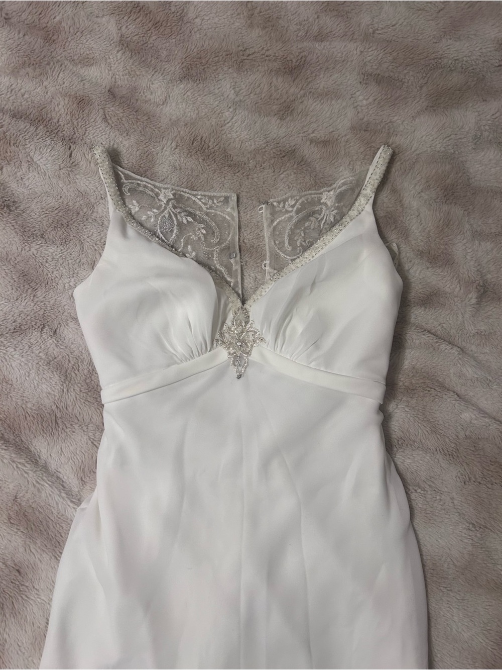 White Lace-Accented Bridal Gown with Beaded V-Neck